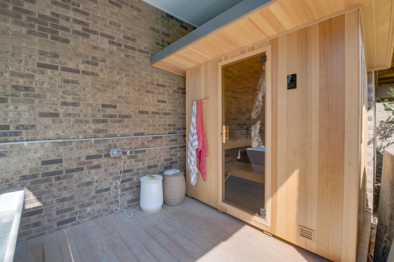 Cedar cabin facade with towel hooks