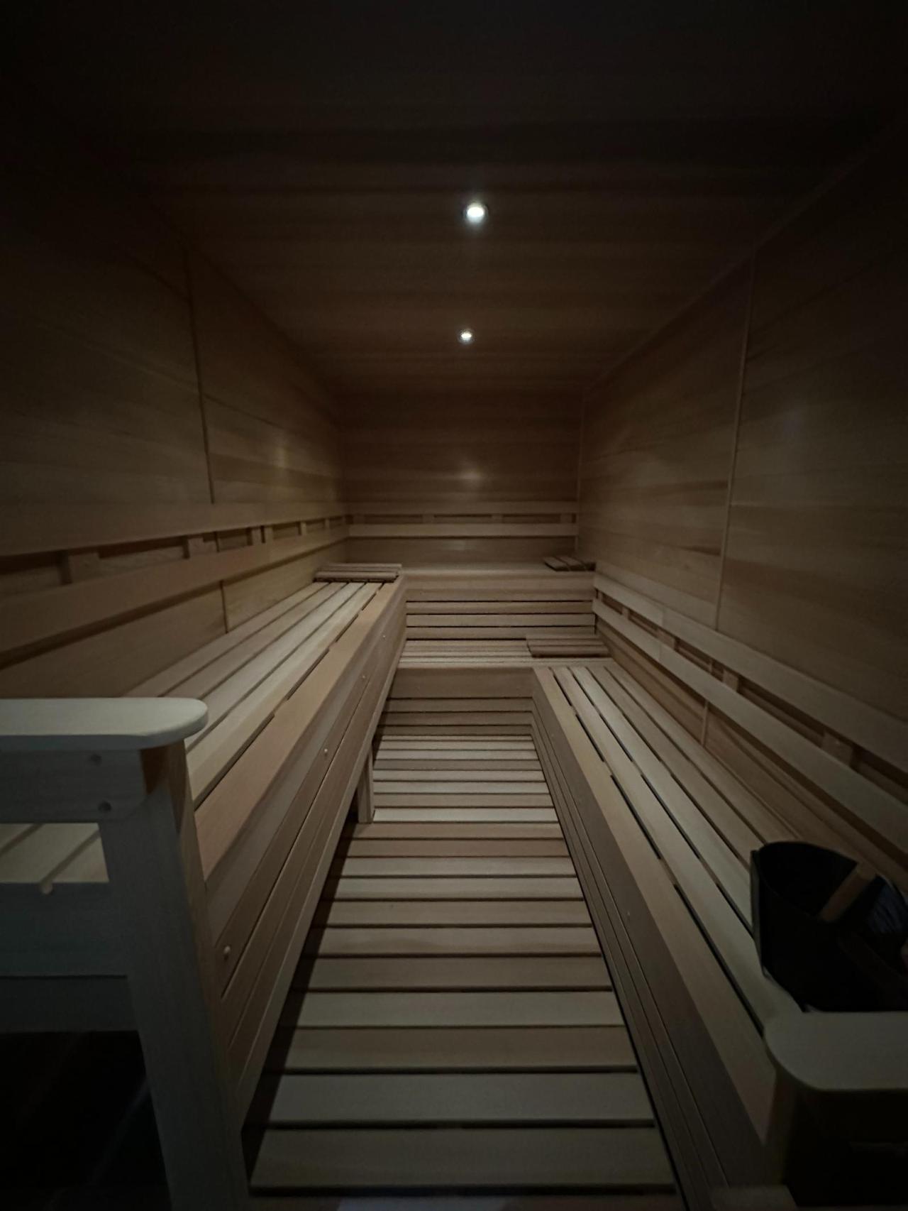 Long axial view down a traditional cedar sauna