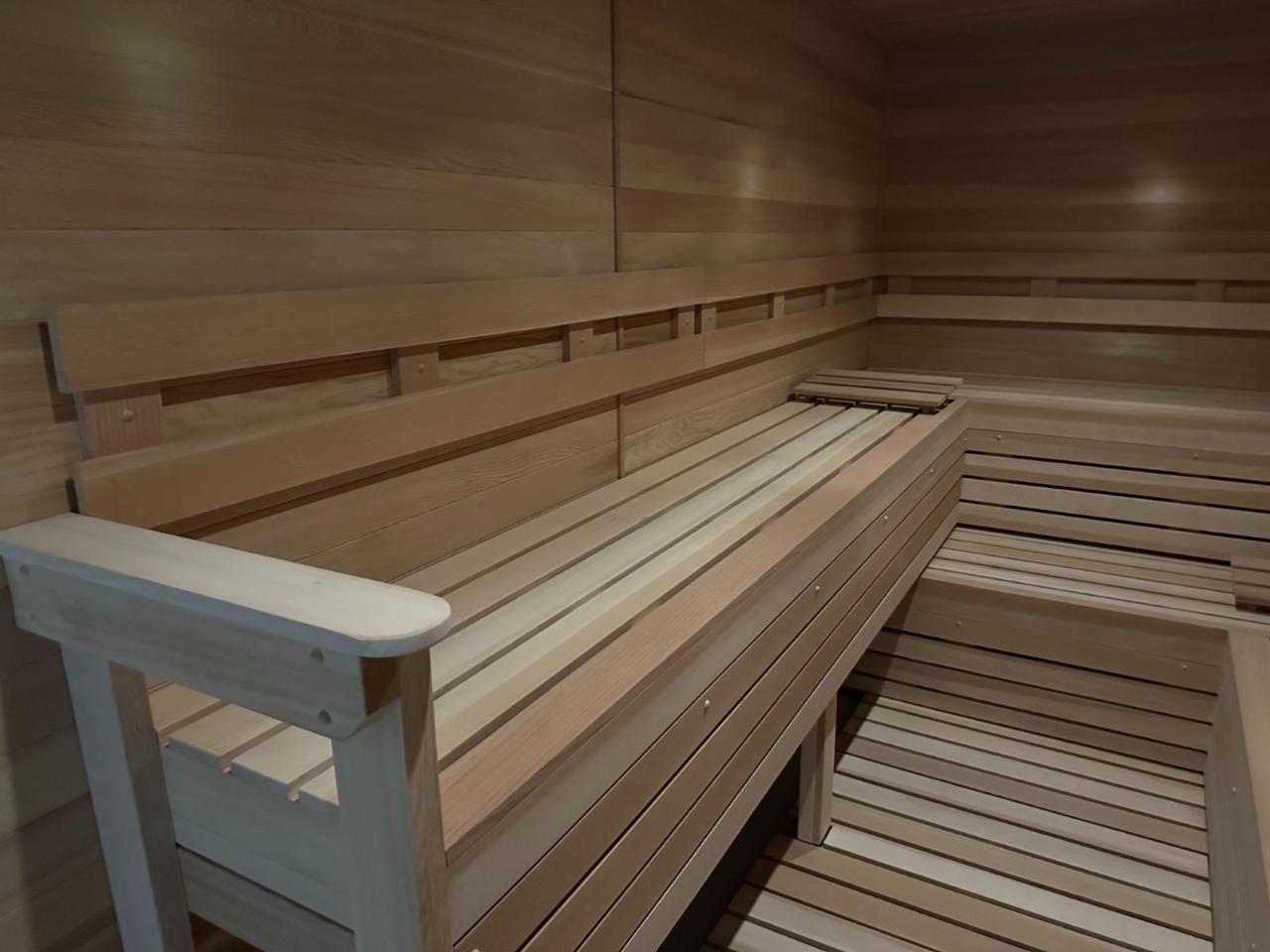 Bench detail with backrest pegs and armrest