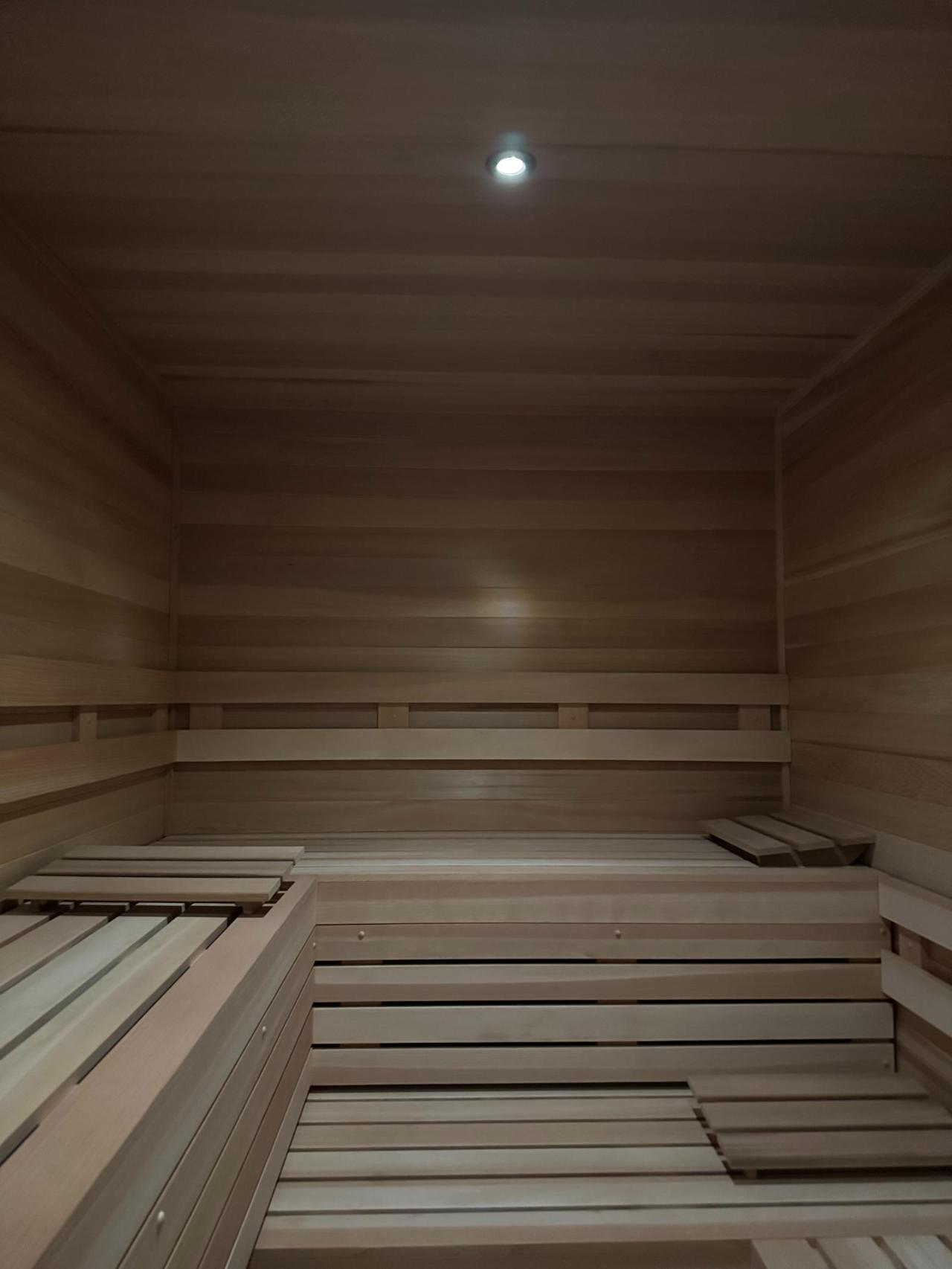 Soft warm light on cedar back-wall benches